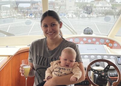 Woman and baby on board yacht